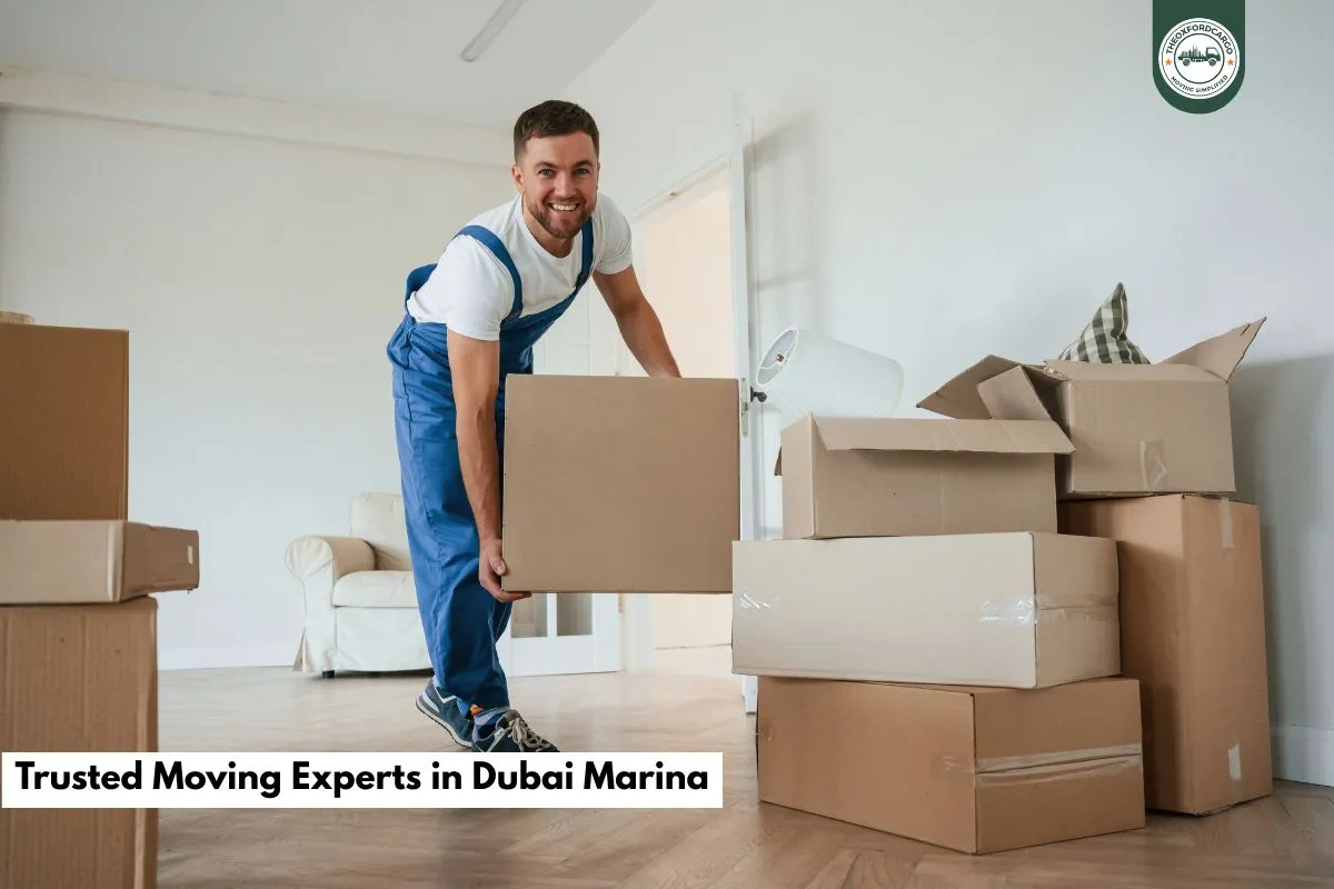 Happy customer receiving items from Oxford Star Movers Dubai Marina, smiling movers assisting